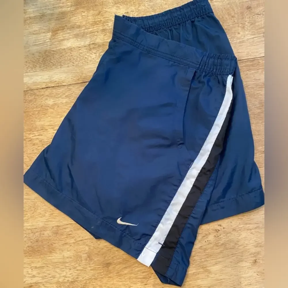 Nike Women’s Size Medium (8-10) Navy Nylon Jogging Shorts With Accent Stripes